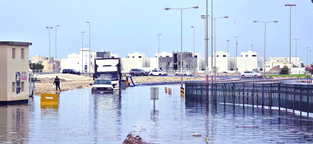 <p>Tankers have been deployed across the kingdom to collect accumulated rainwater after showers lashed Bahrain yesterday.</p>
<p>Above, rainwater being drained out from a waterlogged area.</p>